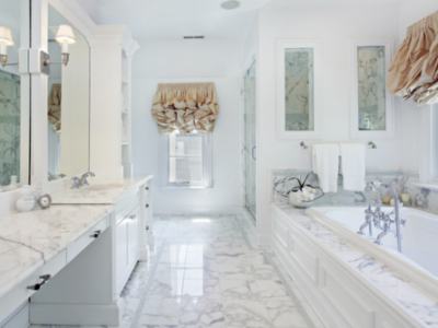 Custom Bathroom Renovations near me in Madisonville, LA St. Tammany Parish with Northshore Renovations and Contractors. Image of a custom-built, clean white bathroom with a bathtub and mirrors, reflecting the latest trends in St. Tammany Parish renovation styles.