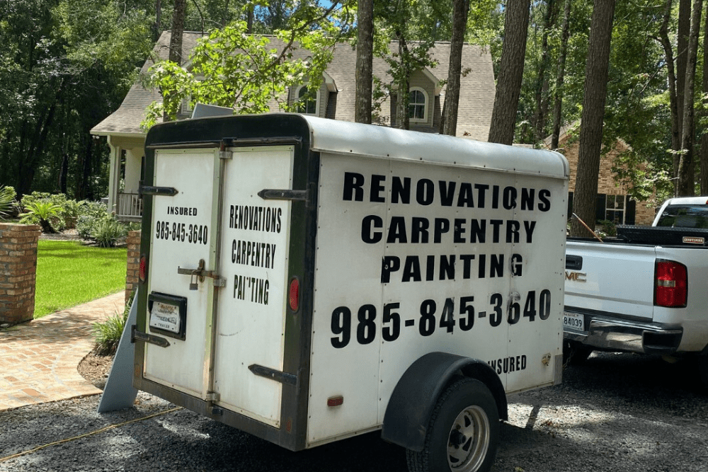 Home Renovation Contractors in Madisonville, LA by Northshore Renovations and Contracting. Image of a service trailer parked in a residential driveway, showcasing the company’s commitment to professional carpentry, painting, and remodeling services for local homeowners.